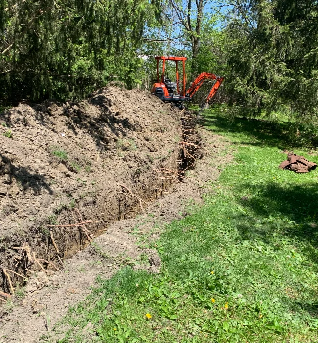Sewer, water and utility trenching